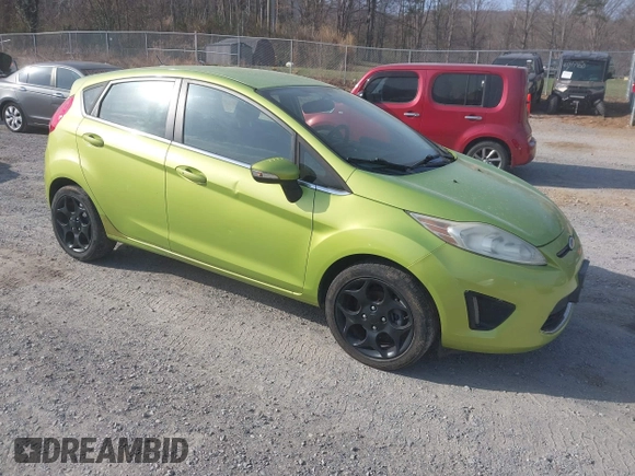 2011 Ford Fiesta SES with VIN 3FADP4FJ4BM108857, listed as a IAAI auction lot 41848272 with 138,943 mi miles. Bid and sale history available at carsss.com. Image 1.