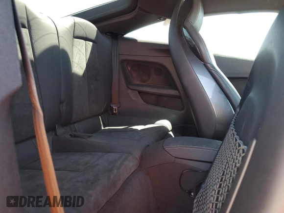 2021 Audi TT z VIN TRUAEAFV8M1002552, wystawiony jako Copart lot #56398935 z przebiegiem 29 150 mil mil oraz Szkoda całkowita • Salvage title. Historia ofert i sprzedaży dostępna na DreamBid. Obrazek 10.