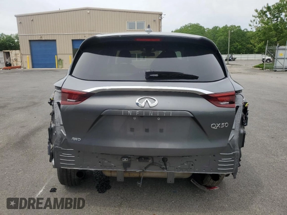 2022 Infiniti QX50 Pure z VIN 3PCAJ5AB2NF111771, wystawiony jako Copart lot #57990815 z przebiegiem 99 210 mil mil oraz Szkoda całkowita • Salvage title. Historia ofert i sprzedaży dostępna na DreamBid. Obrazek 6.