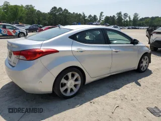 2013 Hyundai Elantra GLS z VIN KMHDH4AE1DU607918, wystawiony jako Copart lot #57078595 z przebiegiem 262 116 mil mil oraz Czysty tytuł • Clean title. Historia ofert i sprzedaży dostępna na DreamBid. Obrazek 3.