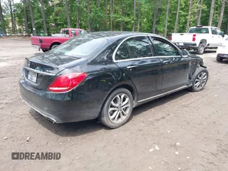 2015 Mercedes-Benz C 300 Luxury with VIN 55SWF4KB5FU002897, listed as a IAAI auction lot 42321165 with 93,960 mi miles and . Bid and sale history available at DreamBid. Image 4.