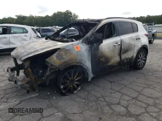 2018 Kia Sportage EX z VIN KNDPN3AC4J7417382, wystawiony jako Copart lot #70246754 z przebiegiem Nie podano mil oraz Szkoda całkowita • Salvage title. Historia ofert i sprzedaży dostępna na DreamBid. Obrazek 1.