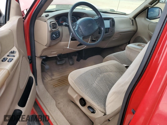 1999 Ford F-150 with VIN 1FTZX1725XNA33332, listed as a Copart auction lot 51867455 with 163,023 mi miles and Salvage title. Bid and sale history available at DreamBid. Image 8.
