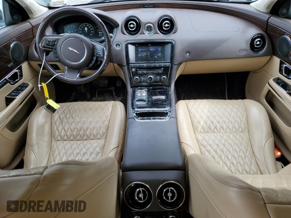 2016 Jaguar XJ Portfolio z VIN SAJWJ2GD0G8V92850, wystawiony jako Copart lot #47844065 z przebiegiem 99 652 mil mil oraz Szkoda całkowita • Salvage title. Historia ofert i sprzedaży dostępna na DreamBid. Obrazek 8.