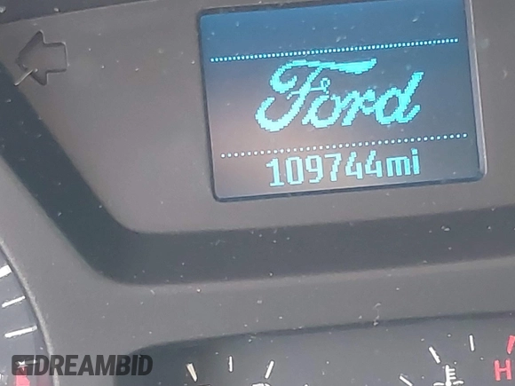 2015 Ford Transit Cargo with VIN 1FTNR1ZMXFKA38419, listed as a IAAI auction lot 41216802 with 109,744 mi miles and . Bid and sale history available at DreamBid. Image 14.