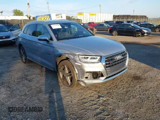 2018 Audi SQ5 Premium Plus with VIN WA1A4AFY1J2219318, listed as a IAAI auction lot 42769549 with 50,664 mi miles and . Bid and sale history available at DreamBid. Image 1.