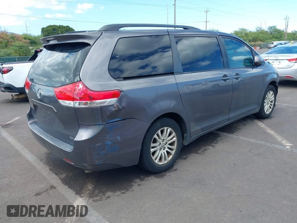2013 Toyota Sienna XLE AAS with VIN 5TDYK3DC4DS363908, listed as a IAAI auction lot 42360224 with 110,469 mi miles and . Bid and sale history available at DreamBid. Image 4.
