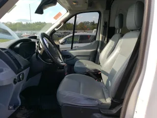 2016 Ford Transit Cargo with VIN 1FTYR2CM1GKA95802, listed as a Copart auction lot 67129054 with 69,590 mi miles and Salvage Title. Bid and sale history available at DreamBid. Image 7.