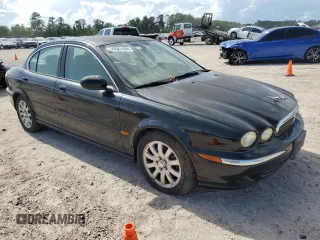 2003 Jaguar X-Type 2.5L Manual z VIN SAJEA51D73XD21289, wystawiony jako Copart lot #59583194 z przebiegiem 70 333 mil mil oraz Czysty tytuł • Clean title. Historia ofert i sprzedaży dostępna na DreamBid. Obrazek 4.