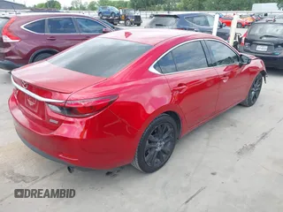 2016 Mazda 6 i Grand Touring z VIN JM1GJ1W58G1486694, wystawiony jako IAAI lot #42094443 z przebiegiem 77 803 mil mil oraz . Historia ofert i sprzedaży dostępna na DreamBid. Obrazek 4.