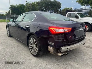 2015 Maserati Ghibli z VIN ZAM57XSA2F1159438, wystawiony jako Copart lot #49187735 z przebiegiem 73 996 mil mil oraz Szkoda całkowita • Salvage title. Historia ofert i sprzedaży dostępna na DreamBid. Obrazek 2.