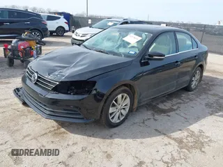 2016 Volkswagen Jetta Sedan 1.4T SE with VIN 3VWD67AJ3GM390273, listed as a IAAI auction lot 41575074 with 114,705 mi miles. Bid and sale history available at carsss.com. Image 2.