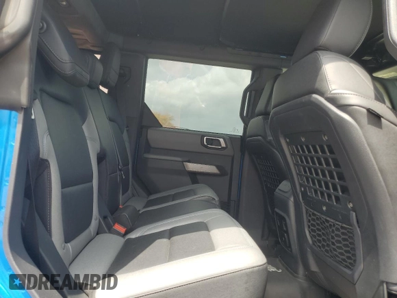 2023 Ford Bronco with VIN 1FMDE5DH1PLA85211, listed as a Copart auction lot 54754075 with 33,535 mi miles and Salvage Title. Bid and sale history available at DreamBid. Image 11.