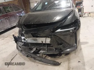 2024 Lexus RZ 300e Premium z VIN JTJABABB4RA001496, wystawiony jako IAAI lot #41402646 z przebiegiem 4 819 mil mil oraz . Historia ofert i sprzedaży dostępna na DreamBid. Obrazek 12.