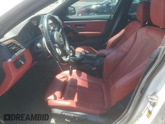 2015 BMW 4 Series 428i xDrive with VIN WBA4C9C50FG135058, listed as a Copart auction lot 60287555 with 86,809 mi miles and Salvage title. Bid and sale history available at DreamBid. Image 7.