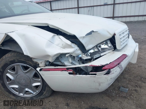 1998 Cadillac Eldorado z VIN 1G6EL12Y2WU603722, wystawiony jako IAAI lot #41879733 z przebiegiem 81 780 mil mil oraz . Historia ofert i sprzedaży dostępna na DreamBid. Obrazek 6.