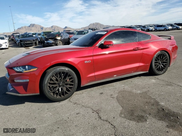 2021 Ford Mustang GT with VIN 1FA6P8CF4M5125716, listed as a Copart auction lot 43787205 with 19,777 mi miles and Salvage Title. Bid and sale history available at carsss.com. Image 1.
