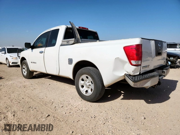 2007 Nissan Titan LE with VIN 1N6BA06AX7N242455, listed as a Copart auction lot 61811175 with 211,040 mi miles and Salvage title. Bid and sale history available at DreamBid. Image 2.