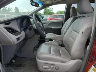 2016 Toyota Sienna XLE with VIN 5TDYK3DC4GS734554, listed as a Copart auction lot 54354815 with 58,506 mi miles and Salvage Title. Bid and sale history available at DreamBid. Image 7.