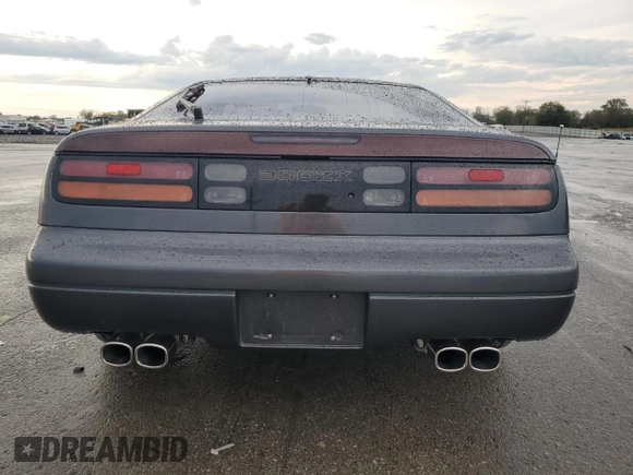 1990 Nissan 300ZX z VIN JN1RZ24A2LX013102, wystawiony jako Copart lot #73137144 z przebiegiem 147 952 mil mil oraz Szkody całkowita. Historia ofert i sprzedaży dostępna na DreamBid. Obrazek 6.