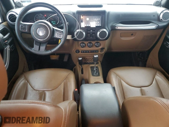 2014 Jeep Wrangler Unlimited Sahara with VIN 1C4HJWEG7EL299548, listed as a Copart auction lot 58522355 with 76,057 mi miles and Clean title. Bid and sale history available at DreamBid. Image 8.