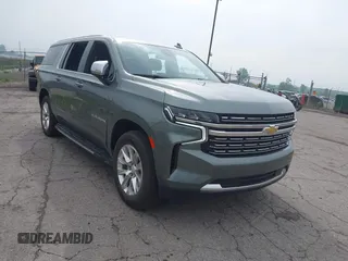2023 Chevrolet Suburban Premier z VIN 1GNSCFKD3PR280397, wystawiony jako IAAI lot #42448316 z przebiegiem 79 458 mil mil oraz . Historia ofert i sprzedaży dostępna na DreamBid. Obrazek 1.