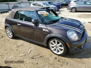 2013 MINI Convertible S with VIN WMWZP3C51DT551311, listed as a Copart auction lot 56083284 with Not provided miles and Salvage title. Bid and sale history available at DreamBid. Image 4.