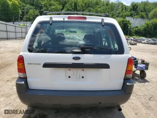 2003 Ford Escape XLS Popular with VIN 1FMYU92163KC43110, listed as a Copart auction lot 58699684 with 66,450 mi miles and Salvage Title. Bid and sale history available at carsss.com. Image 6.