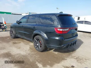 2019 Dodge Durango SRT with VIN 1C4SDJGJ2KC550562, listed as a IAAI auction lot 41549390 with 51,217 mi miles and . Bid and sale history available at DreamBid. Image 3.