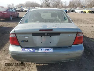 2005 Ford Focus S with VIN 1FAFP34NX5W175332, listed as a Copart auction lot 49306815 with 146,290 mi miles and Salvage Title. Bid and sale history available at carsss.com. Image 6.