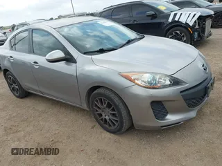 2012 Mazda 3 i Touring z VIN JM1BL1V75C1558873, wystawiony jako IAAI lot #42170999 z przebiegiem 132 855 mil mil oraz . Historia ofert i sprzedaży dostępna na DreamBid. Obrazek 1.