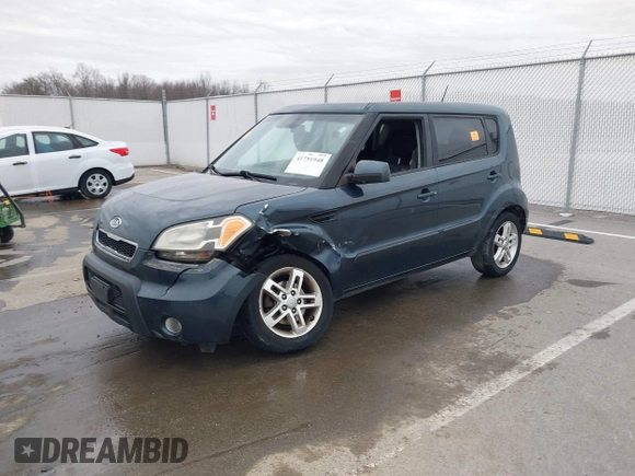 2011 Kia Soul + with VIN KNDJT2A24B7258457, listed as a IAAI auction lot 41751948 with 217,667 mi miles. Bid and sale history available at carsss.com. Image 2.