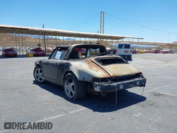 1988 Porsche 911 z VIN WP0EB0917JS161351, wystawiony jako IAAI lot #39908257 z przebiegiem Nie podano mil oraz . Historia ofert i sprzedaży dostępna na DreamBid. Obrazek 6.