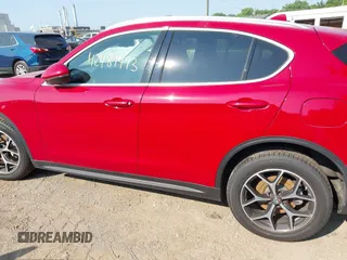 2019 Alfa Romeo Stelvio Ti z VIN ZASPAKBNXK7C31179, wystawiony jako IAAI lot #42489493 z przebiegiem 53 843 mil mil oraz . Historia ofert i sprzedaży dostępna na DreamBid. Obrazek 14.