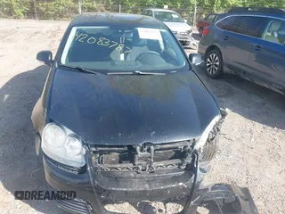 2008 Volkswagen Jetta S z VIN 3VWJM71K88M021296, wystawiony jako IAAI lot #42083787 z przebiegiem 170 777 mil mil oraz . Historia ofert i sprzedaży dostępna na DreamBid. Obrazek 6.