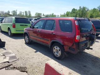 2006 Honda CR-V LX with VIN JHLRD68556C001167, listed as a IAAI auction lot 42104036 with 113,590 mi miles and . Bid and sale history available at DreamBid. Image 3.