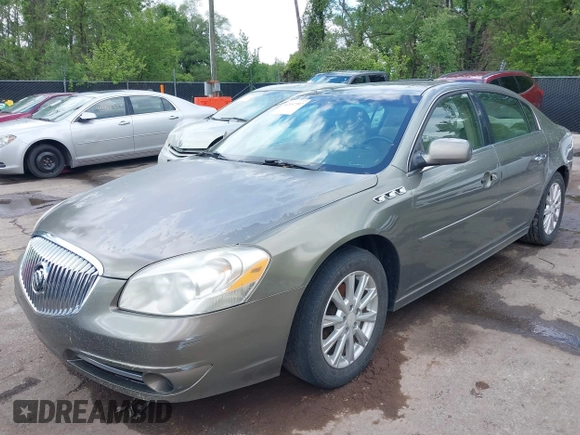 2011 Buick Lucerne CXL with VIN 1G4HC5EM6BU103482, listed as a IAAI auction lot 42157397 with 143,267 mi miles and . Bid and sale history available at carsss.com. Image 2.
