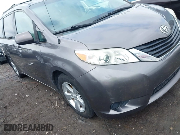 2014 Toyota Sienna LE AAS with VIN 5TDKK3DC3ES506466, listed as a IAAI auction lot 41908023 with 118,297 mi miles and . Bid and sale history available at carsss.com. Image 1.