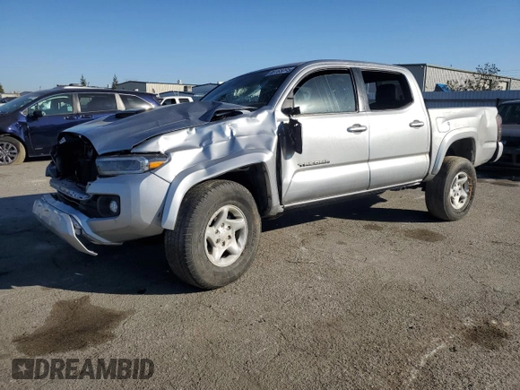 2023 Toyota Tacoma SR with VIN 3TMCZ5AN0PM538974, listed as a Copart auction lot 89165095 with 31,281 mi miles and Salvage title. Bid and sale history available at DreamBid. Image 1.