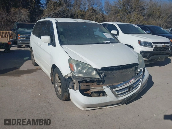 2006 Honda Odyssey EX with VIN 5FNRL38426B400952, listed as a IAAI auction lot 41346853 with 210,826 mi miles and . Bid and sale history available at DreamBid. Image 1.