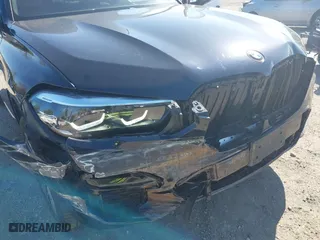 2021 BMW X5 xDrive40i with VIN 5UXCR6C09M9F83785, listed as a IAAI auction lot 41828697 with 57,863 mi miles. Bid and sale history available at carsss.com. Image 6.