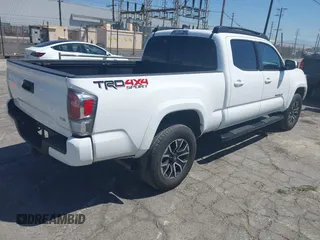 2023 Toyota Tacoma SR5 z VIN 3TMDZ5BN3PM160975, wystawiony jako IAAI lot #42024778 z przebiegiem 41 621 mil mil oraz . Historia ofert i sprzedaży dostępna na DreamBid. Obrazek 4.