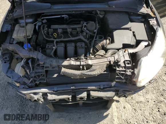 2013 Ford Focus SE z VIN 1FADP3F23DL296908, wystawiony jako Copart lot #57076095 z przebiegiem 160 690 mil mil oraz Szkoda całkowita • Salvage title. Historia ofert i sprzedaży dostępna na DreamBid. Obrazek 11.