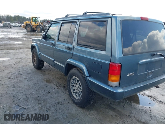 1998 Jeep Cherokee Sport with VIN 1J4FT68S0WL125382, listed as a IAAI auction lot 41551866 with 1 mi miles. Bid and sale history available at carsss.com. Image 3.