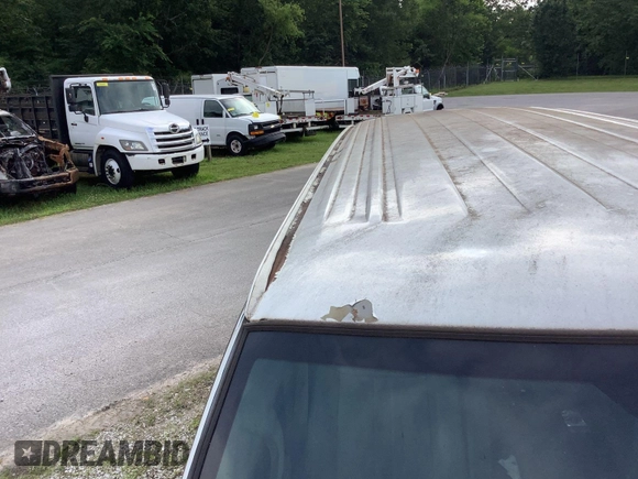 2013 Chevrolet Express Cargo with VIN 1GCZGTCG9D1119386, listed as a IAAI auction lot 42677944 with 370,545 mi miles and . Bid and sale history available at DreamBid. Image 27.
