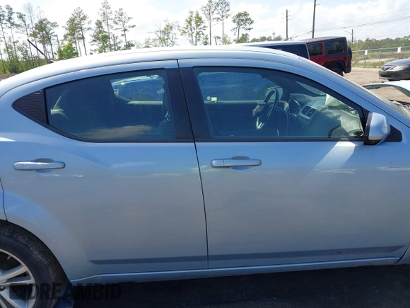 2013 Dodge Avenger SXT with VIN 1C3CDZCB0DN521591, listed as a IAAI auction lot 41891451 with 100,234 mi miles and . Bid and sale history available at carsss.com. Image 13.