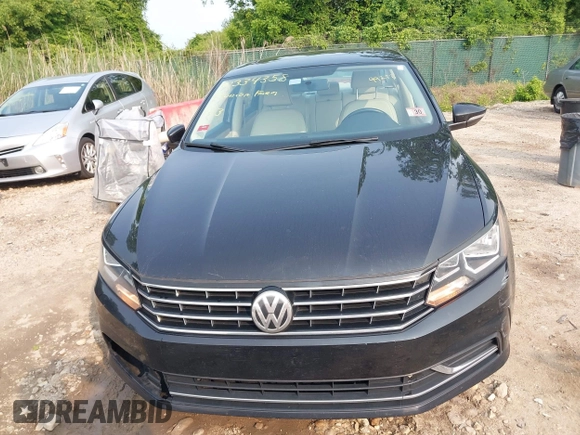 2017 Volkswagen Passat SE with VIN 1VWBT7A39HC032213, listed as a IAAI auction lot 42334358 with 99,277 mi miles and . Bid and sale history available at DreamBid. Image 12.