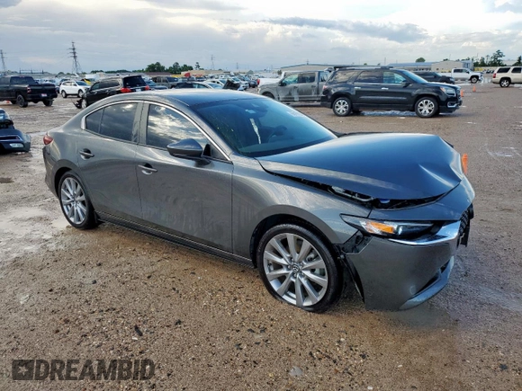 2023 Mazda 3 S Select with VIN 3MZBPABM4PM371032, listed as a Copart auction lot 60151205 with 3,437 mi miles and Salvage title. Bid and sale history available at DreamBid. Image 4.