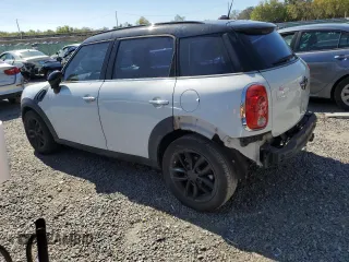 2011 MINI Countryman with VIN WMWZB3C56BWM00040, listed as a Copart auction lot 48660435 with 146,607 mi miles and Salvage title. Bid and sale history available at DreamBid. Image 2.