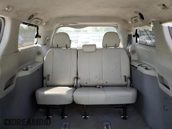 2011 Toyota Sienna XLE with VIN 5TDDK3DC4BS004280, listed as a Copart auction lot 59297345 with 173,890 mi miles and Salvage title. Bid and sale history available at DreamBid. Image 10.